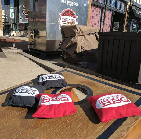 Cornhole - Play Bags on the Patio at Bootleggin BBQ St. Louis Downtown West Washington Avenue